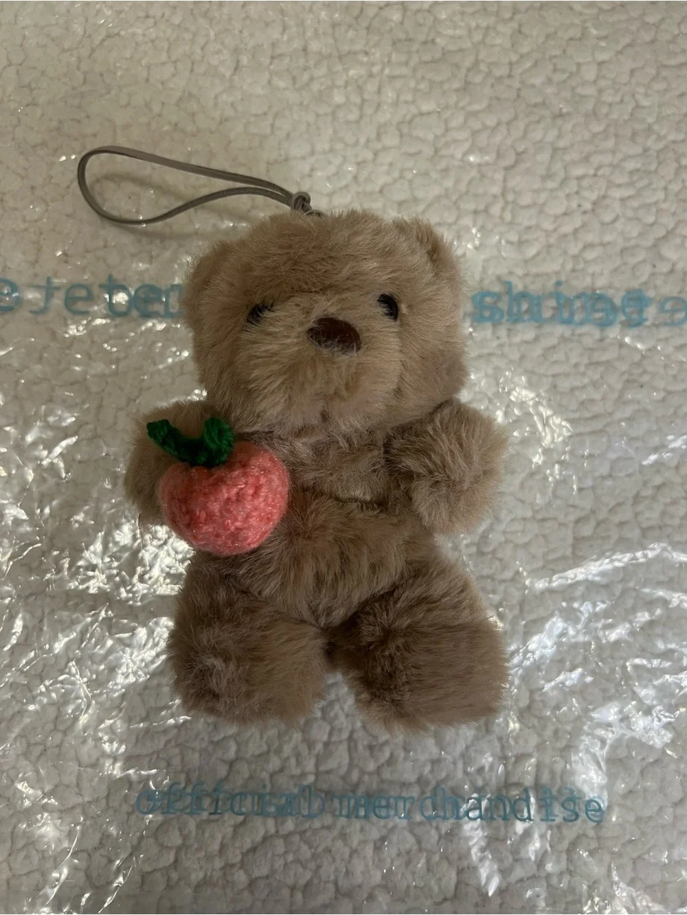 Ariana Grande R.E.M Beauty Bear Keychain + Peach with Blur Butter in Dusty Pink